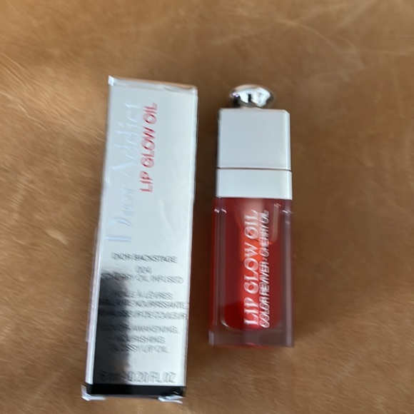 Dior lip glow oil . # 004 coral. - Picture 4 of 6